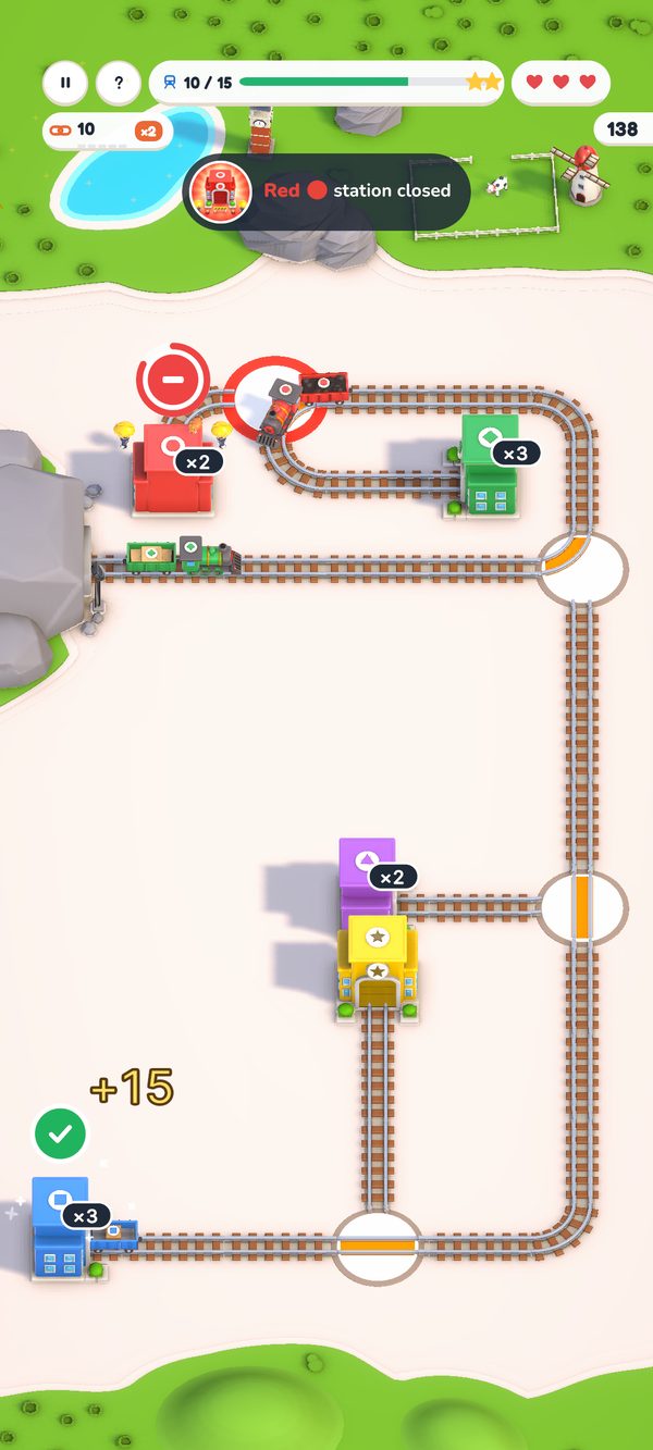 Railway in play: trains on tracks with coloured stations and switches